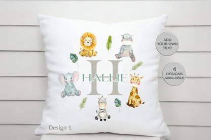Decorative pillow with cartoon animals and the name 'Halle' on a wooden background